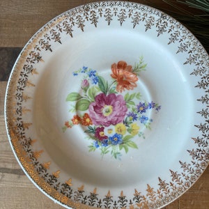 Edwin Knowles saucers-set of 8
