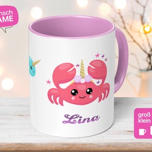 Personalized children&#39;s mug with unicorn crab and desired name - the perfect birthday gift for girls.