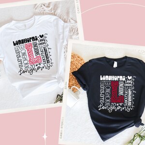 May include: Two t-shirts with a graphic design of the word "Longhorns" in a white font with a red heart and a red "L" with a leopard print pattern. The t-shirts are white and black.