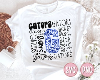 May include: White t-shirt with a blue and black leopard print letter G surrounded by the word "Gators" repeated in different fonts and sizes. The shirt also has the words "SVG" and "PNG" in pink circles at the bottom.