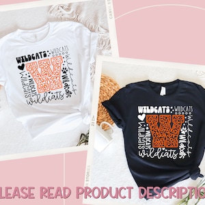 May include: Two t-shirts with a graphic design featuring a large orange and black leopard print letter W surrounded by the text "Wildcats" in white. The shirts are white and black.