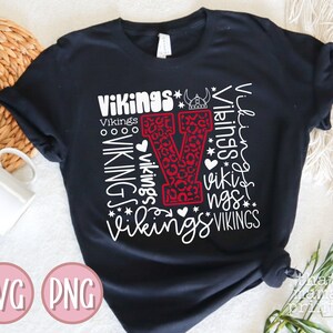 May include: Black t-shirt with a red and white leopard print "V" surrounded by the word "Vikings" in white text.