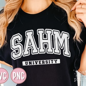 May include: Black t-shirt with white text that reads "SAHM UNIVERSITY". The text is in a distressed, vintage style font.