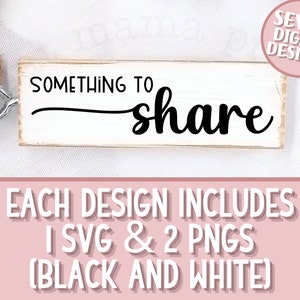 May include: White wooden sign with black text that reads "Something to share". The sign is hanging from a piece of twine. The image includes the text "Seven Digital Designs".
