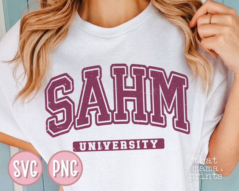 May include: White t-shirt with a maroon graphic that says "SAHM UNIVERSITY".