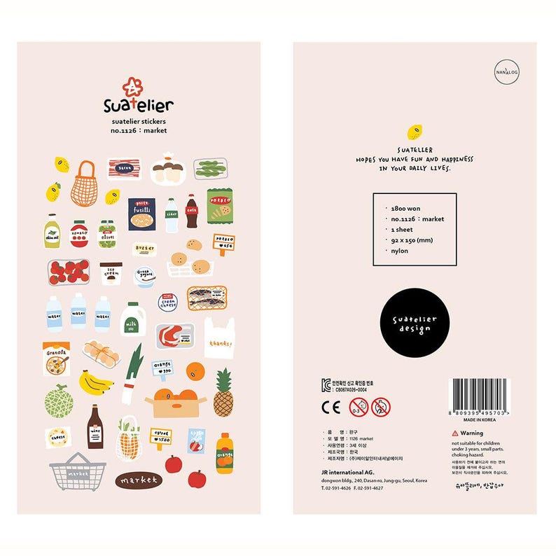 May include: A sheet of Suatelier stickers featuring illustrated grocery items like fruits, vegetables, and packaged foods. The stickers include text and are designed with a playful, colorful aesthetic. The sheet measures 92 x 150 mm.