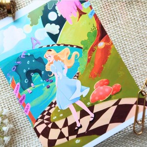 May include: A whimsical illustration of Alice from Alice in Wonderland, walking on a chequered path. The background features a blue sky, green hills, and a large black hole with bubbles. There are pink signs with the words "Back", "Down", and "Umbrella" on the path.