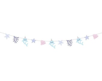 May include: A blue and purple garland with narwhal, starfish, and seashell decorations. The garland is perfect for a nautical themed party.
