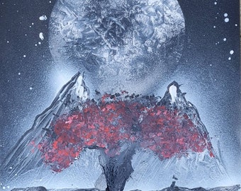 May include: A black and white spray paint artwork depicting a large, white moon in the night sky above a dark, red tree with a thick trunk and branches. The tree is surrounded by white, rocky mountains.