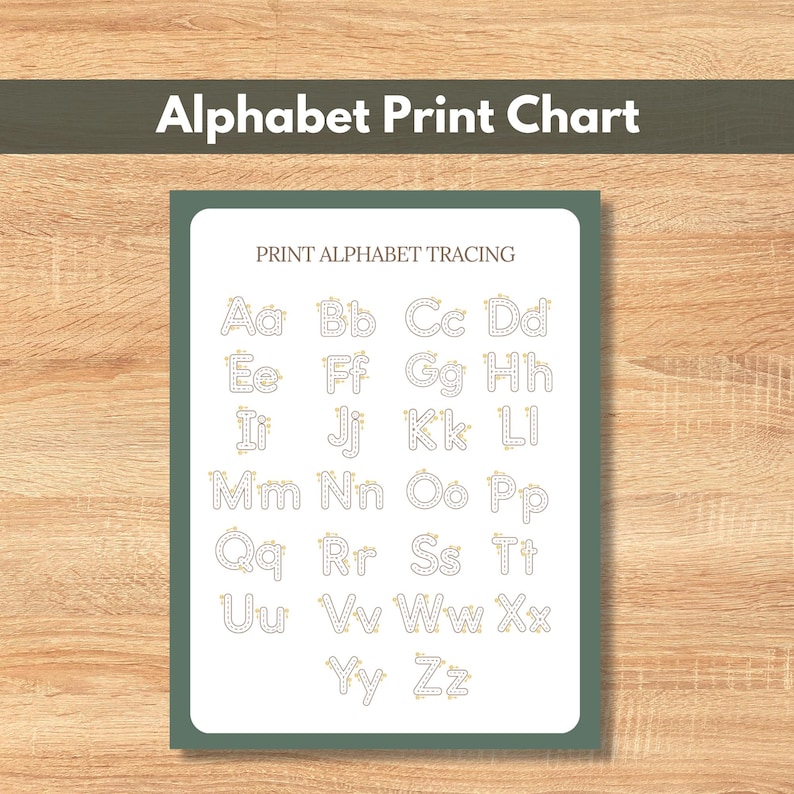 May include: Alphabet Print Chart with the text "PRINT ALPHABET TRACING". The chart features the alphabet in uppercase and lowercase letters, designed for tracing. The letters are in a dotted line format, with small decorative elements. The background is white with a green border.