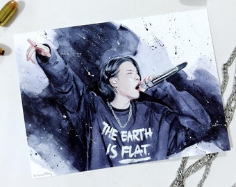 May include: A watercolor painting of a person singing into a microphone. The person is wearing a black shirt with the words "The Earth is Flat" written on it. The background is a dark blue with white splatters.