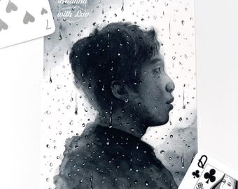 May include: A black and white watercolor portrait of a person in profile, with rain droplets overlaying the image. The text "Brianna with Luv" is in the upper left corner. Playing cards with hearts and clubs are in the frame.