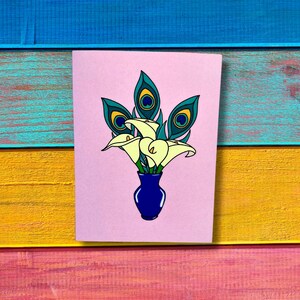 Plumas y Flores Greeting Card