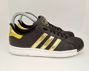 black and gold shell top adidas