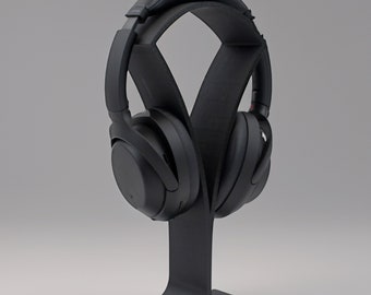 Modern headphone stand, elegant black, robust and simple design, perfect for office and home