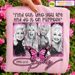 May include: A light pink sweatshirt featuring the text "Find out who you are And do it on purpose" above four black and white portraits of Dolly Parton. A large pink butterfly graphic sits below the portraits with the text "1946-2026" and "Dolly".