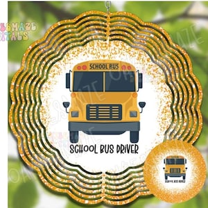 May include: A gold glitter wind spinner with a yellow school bus in the center. The text "School Bus Driver" is below the bus. The wind spinner has a smaller version of the design on the bottom.