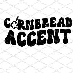 Puede incluir: Diseño gráfico en blanco y negro con el texto "Cornbread Accent" en un estilo de fuente retro. Una pequeña sartén con una estrella en su interior está por encima de la palabra "Cornbread".