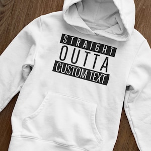 Puede incluir: Sudadera con capucha blanca con texto negro que dice "STRAIGHT OUTTA CUSTOM TEXT".