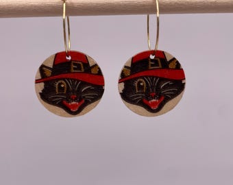 Cute Halloween handcrafted lightweight wooden dangle earrings. Witchy cats Decoupage circles on hoops. Autumn Jewellery black red witch cat