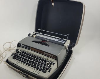 Automatyczna maszyna do pisania SCM Smith Corona Electra 210 z twardą obudową. Testowana.