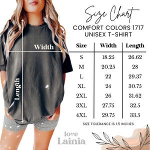 May include: A size chart for a Comfort Colors 1717 unisex t-shirt. The chart shows sizes S to 4XL with width and length measurements in inches. The text "love Lainia" is at the bottom. Size tolerance is 1.5 inches.