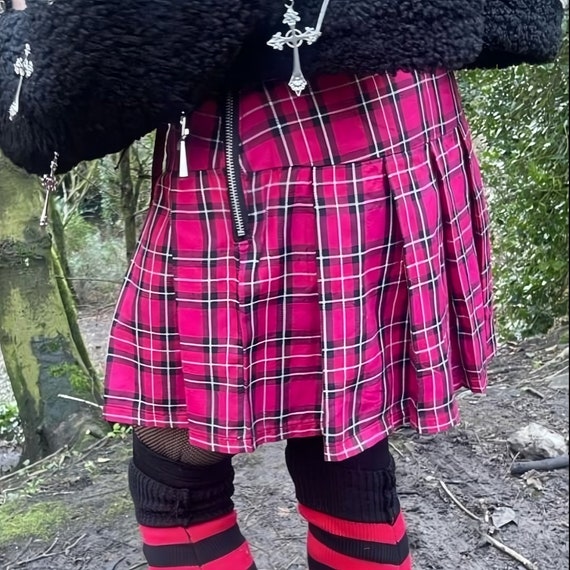 Pink plaid skirt era 2025
