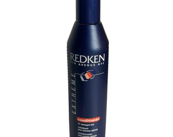 Acondicionador Redken Extreme para cabello dañado / 8.5 fl oz / Botella usada