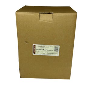 May include: A brown cardboard box with a white product label centered on the front. The label reads Longaberger Pottery, Classic Bold Plaid 3 Qt Canister, 31545, Made in China, and lists colors Cornflower, Paprika, and Butternut with a barcode.