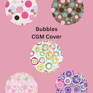May include: A pink background features five circular designs with bubble patterns in various colors. The designs include pink, white, brown, blue, green, yellow, and purple circles. The text "Bubbles CGM Cover" is centered on the image.