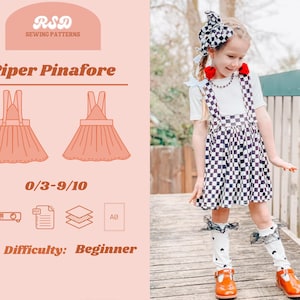 May include: A sewing pattern for a Piper Pinafore dress for children sizes 0/3-9/10. The pattern is available in PDF format and includes instructions for sewing the dress. The pattern is labeled as beginner difficulty.