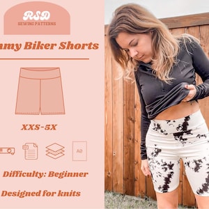 May include: A digital illustration of a pair of biker shorts on a white background. The shorts are pink and have a waistband. The text "Mommy Biker Shorts" is at the top of the image. The text "XXS-5X" is below the shorts. The text "Difficulty: Beginner" and "Designed for knits" are at the bottom of the image.