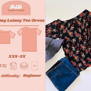 Puede incluir: Un patrón de costura para una camiseta o vestido Mommy Lainey en tallas XXS-5X, de nivel principiante. La imagen muestra una blusa negra de hombros descubiertos con estampado floral rojo, amarillo y verde, junto a unos vaqueros azules y un sombrero gris.