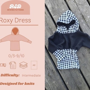 May include: A black and white checkered hooded top with a black waffle-knit body. The image also shows a sewing pattern with the text "Roxy Dress", designed for knits, and a difficulty level of intermediate.