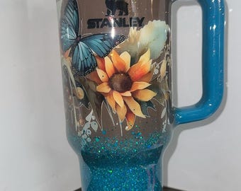 Custom Stanley. Sunflower brown/turquoise  choice of 30oz or 40oz.  Can add a name. Topper and bow can be purchased with it.