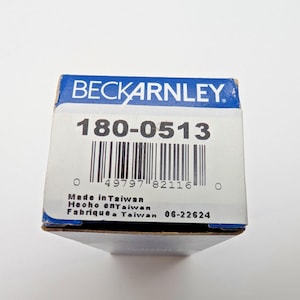 May include: A white and blue cardboard box with the text "BECKARNLEY" at the top. The box has the number "180-0513" and a barcode. The bottom of the box reads "Made in Taiwan", "Hecho en Taiwan", and "Fabrique Taiwan".