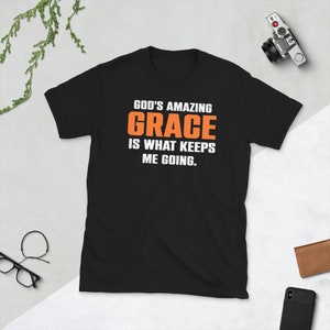 Christliches Shirt God es Grace Is What Keeps Me Going Kurzärmeliges Unisex T-Shirt