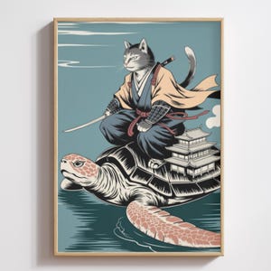 May include: A framed art print featuring a cat samurai riding a giant turtle. The cat is dressed in traditional Japanese attire, holding a sword. The turtle carries a pagoda on its back, set against a teal background.