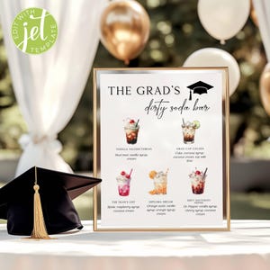 May include: A framed sign with the text "THE GRAD'S dirty soda bar" and illustrations of soda drinks. A graduation cap is on the left. The sign lists drink recipes like "Vanilla Valedictorian" and "Grad Cap Colada". Gold and white balloons are in the background.