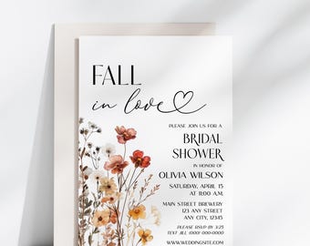 May include: A white invitation card with the text "FALL in love" and "BRIDAL SHOWER". The card features floral watercolor illustrations in shades of orange, red, and yellow. The invitation is for Olivia Wilson's bridal shower.
