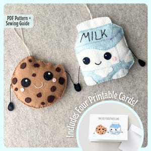 Peut inclure: Un kit de couture en feutre comprenant un carton de lait et un biscuit, tous deux avec des visages souriants. Le kit comprend quatre cartes imprimables avec le texte "We go together like" et des illustrations du carton de lait et du biscuit.