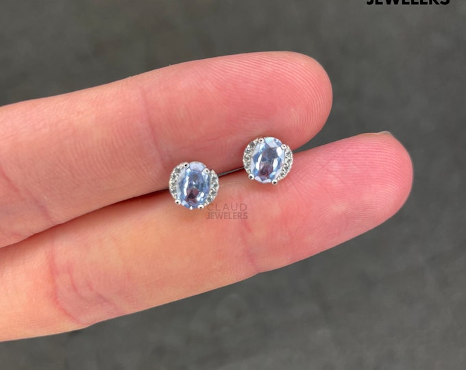 Sterling Silver Halo Cubic Zirconia Light Blue Topaz Oval Cut Stud Earrings