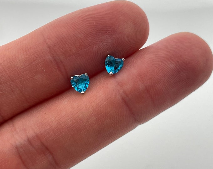 Sterling Silver Created Blue Topaz Heart Cut Stud Earrings