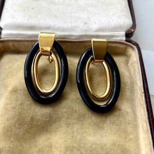 1980s Napier designer black and gold large oval statement earrings pierced ears