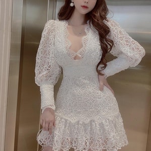 White babydoll ruffle mini dress size Small