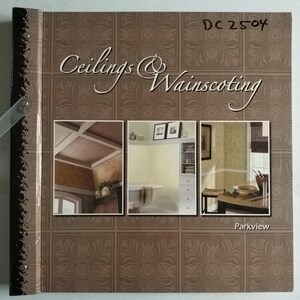 May include: A catalog titled "Ceilings & Wainscoting" with a brown patterned cover. The cover features three interior design images and the name "Parkview". The catalog's cover has the text "DC 2504".
