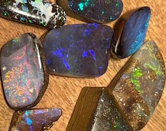 Natural Australian Boulder Opal freeform cabochon.....41x13x6mm....32CTS....B#2553