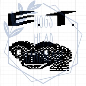 May include: Black and white pixelated image of the letters "ET" with a distorted, pixelated image of a face below. The text "HOGS HEAD HANDMADE" is visible in the background.