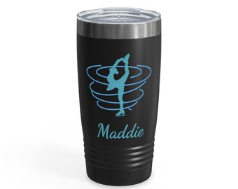 May include: Black stainless steel tumbler with a blue silhouette of a figure skater spinning in a circle. The tumbler has a black lid and the name "Maddie" is printed on the front.