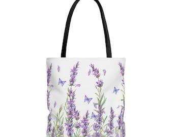 May include: White tote bag with a black handle featuring a watercolor design of lavender sprigs and blue butterflies. The bag has a rectangular shape and is made of a durable fabric.